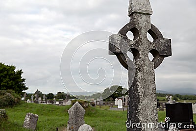 Old grave cross on celtic cemetery in ireland Stock Photo