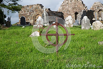 Old grave cross on celtic cemetery in ireland Stock Photo