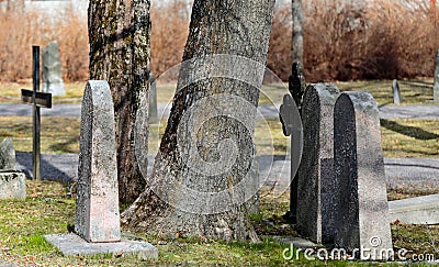 Old graves in very old graveyard Stock Photo