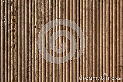 Old gray brown beige wavy wooden surface with peeling paint and vertical lines. rough texture Stock Photo