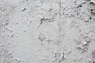 Old gray cracked paint wall background Stock Photo