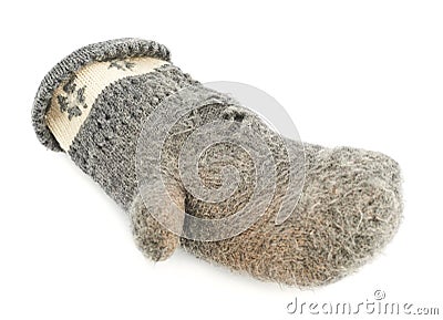 Old gray frayed mitten isolated Stock Photo