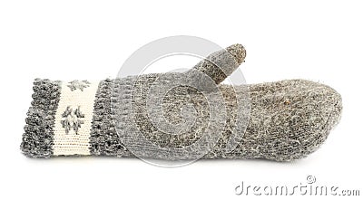 Old gray frayed mitten isolated Stock Photo
