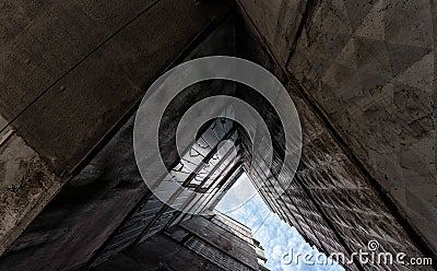 Old gray tall building without people bottom view Stock Photo