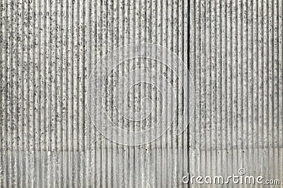 Old gray zinc plate fence wall texture background, pattern of galvanized metal panel sheeting Stock Photo