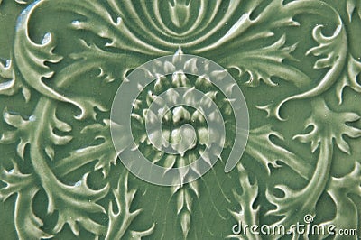 Green Ceramic Tile with Floral Pattern Stock Photo