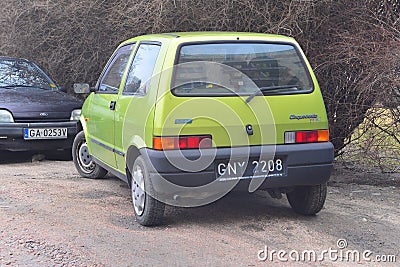 Old green Fiat Cinquecento parked Editorial Stock Photo
