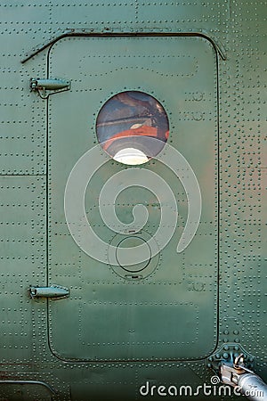 Old green painted aircraft door. Stock Photo