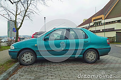 Old green private car Fiat Siena sedan car parked Editorial Stock Photo