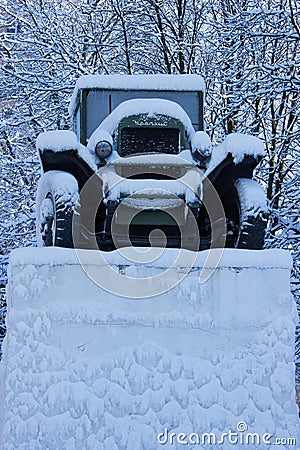 Old green truck covered with snow Stock Photo