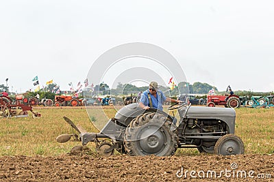 Old grey massey fergusen tractor at ploughing match Editorial Stock Photo