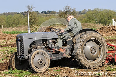 Old grey massey fergusen tractor at ploughing match Editorial Stock Photo