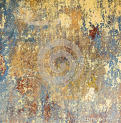 Grunge wall of an old house with remainings of color Stock Photo