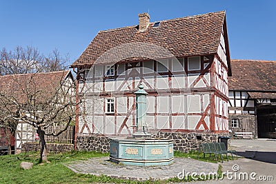 Old half timbered house with fountain Editorial Stock Photo