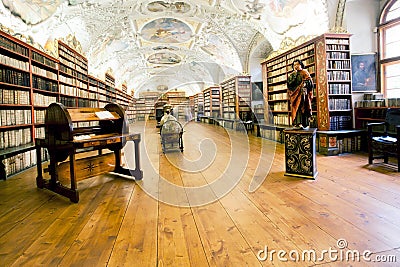 Old hall with books in an ancient monastery Editorial Stock Photo