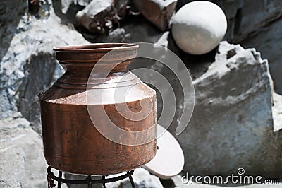 Old hammered brass vessel Stock Photo