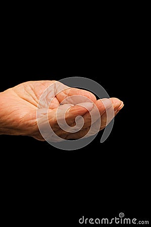 The old hand begging on the black Stock Photo