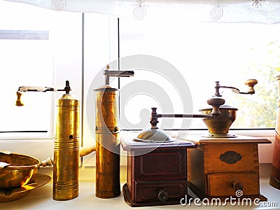 Old handmade bronze coffee grinders Stock Photo