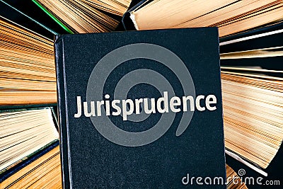 Old hardback books with book Jurisprudence on top Stock Photo