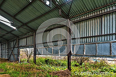 Old hay storage. Abandoned collective farm. Stock Photo