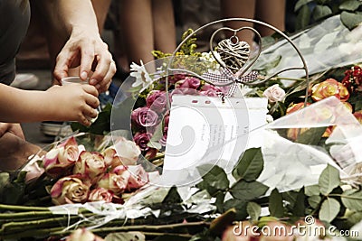 Old helping young - in memory of the victims Editorial Stock Photo