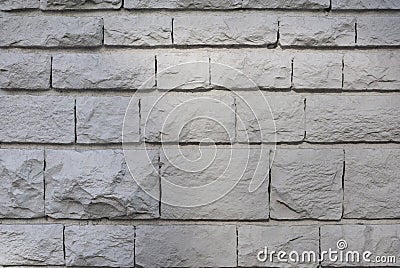 Old hewn stone wall, beautiful background texture. Stock Photo