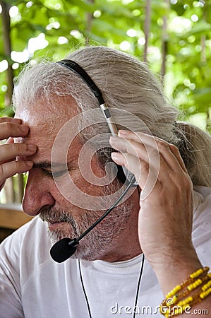 old hispanic man in headphones. distance learning for educational pursuits. opportunities of remote education. virtual classrooms Stock Photo
