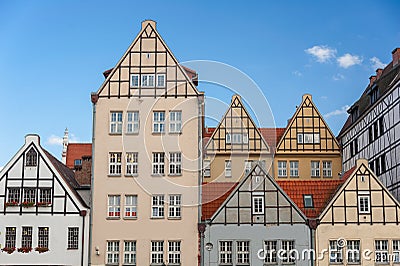 Historic granary houses on Granary Island, Gdansk, Poland. Medieval architecture with clear blue sky background Stock Photo