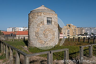 Old historic stone tower, former windmill, in Povoa de Varzim, Portugal. Stock Photo