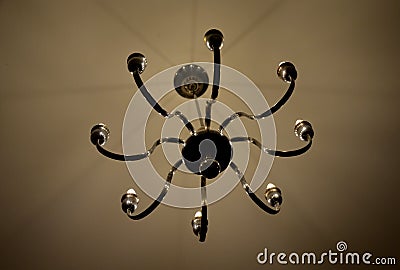 old historical eight-armed chandelier. silver single with spruce cone Stock Photo