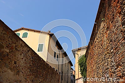 Old homes and brick walls in an ancient European town Stock Photo