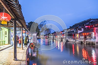 Old house along the river and Misty Rain gallery at night Editorial Stock Photo