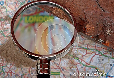 An Old House Brick Over a Blurred London Map. Stock Photo