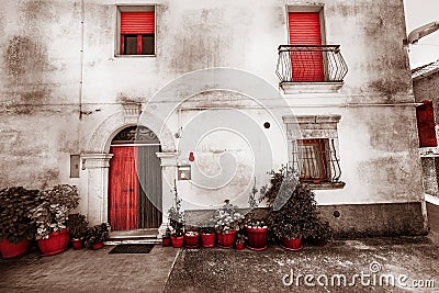 Old house facade. Vintage color. Red isolated. Stock Photo