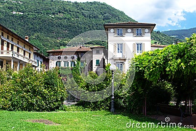 Old house among the greenery in the city of Pisogne Stock Photo