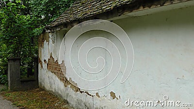 Old house with ruined wall, in a small town in Serbia Stock Photo