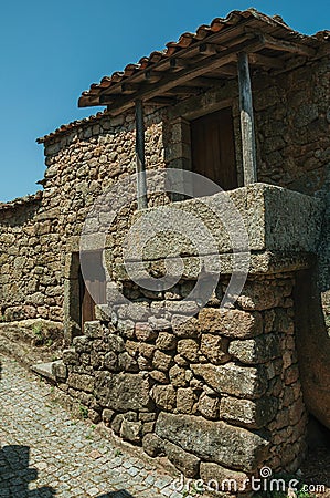 Old house with staircase going to a small porch in Monsanto Stock Photo