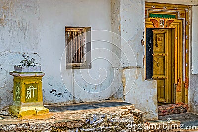 Old House with Yellow wooden door and Frame work Annigeri village, Dharwad, Editorial Stock Photo