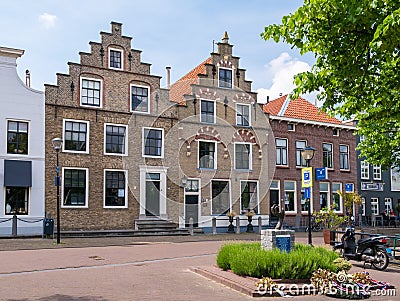 Old houses with stepped gables in Oud-Beijerland, Netherlands Editorial Stock Photo