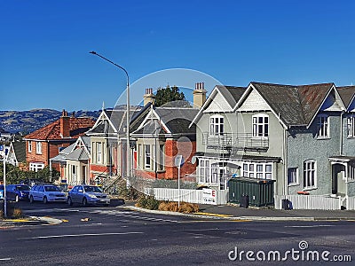 Old houses on a street in Dunedin in the Otago region of the South Island of New Zealand Editorial Stock Photo