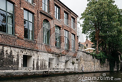 Old industrial brick building in the medieval city of Bruges Editorial Stock Photo