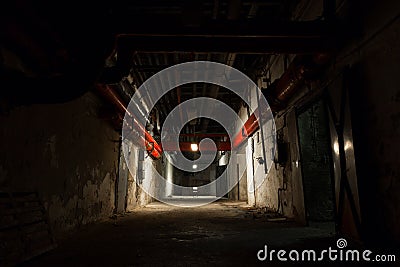 Old industrial building, basement with little light Stock Photo