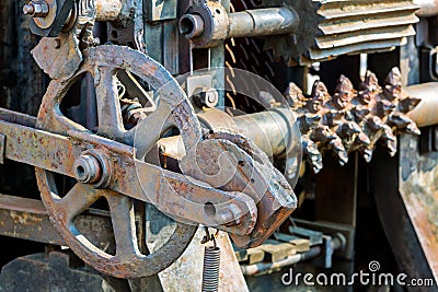 Old industrial mechanism closeup. rusty cogwheels and gears. Stock Photo