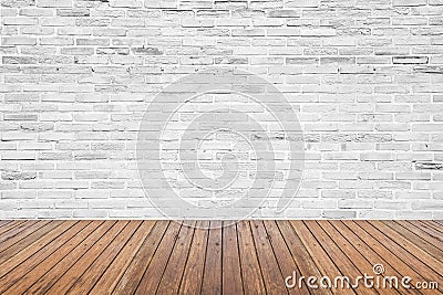 Old interior room with brick wall and wood floor Stock Photo