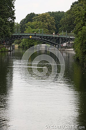 Old iron bridge over the river in Berlin. Stock Photo