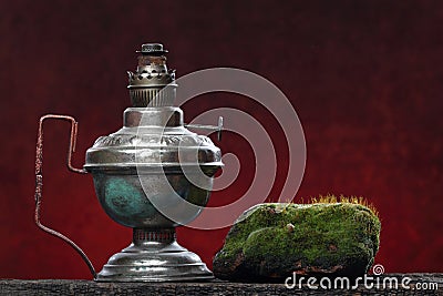 Old iron lamp still life. Ecologic concept Stock Photo