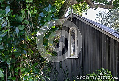 Old iron shed with long window Stock Photo