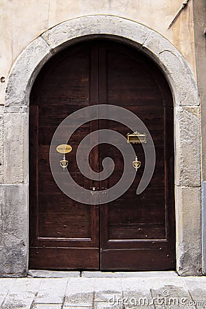 Old Italian door. Stock Photo