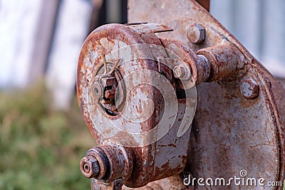 House lifting jack. Old rusty mechanical screw jack Stock Photo