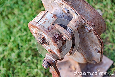 House lifting jack. Old rusty mechanical screw jack Stock Photo